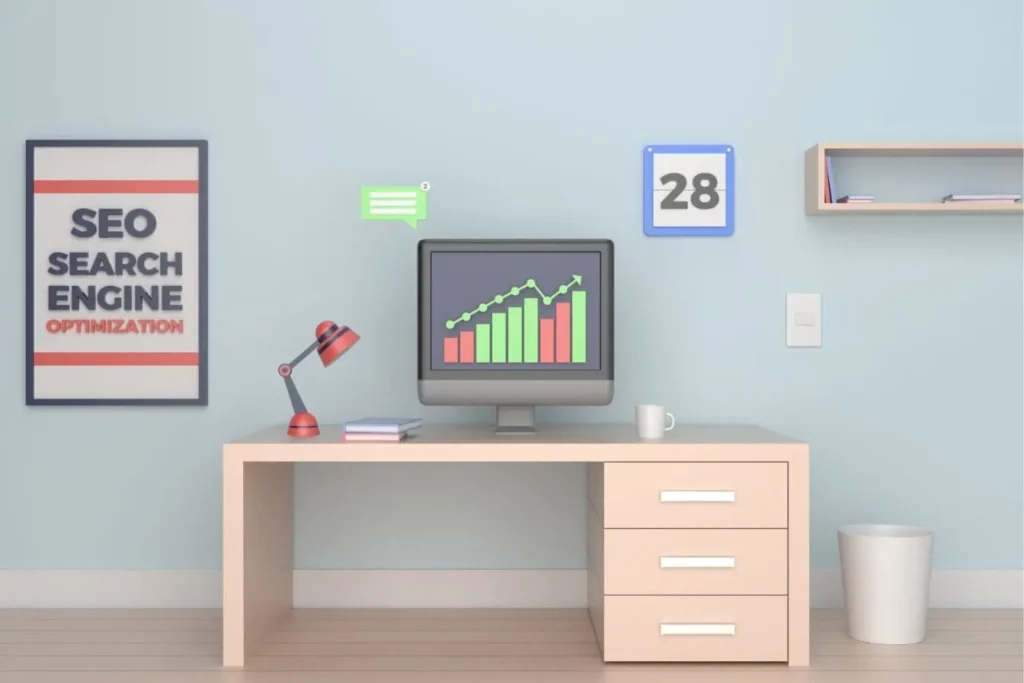 Bureau minimaliste avec écran affichant graphiques SEO et affiche murale, reflet d’une architecture en silo thématique pour optimiser le référencement.